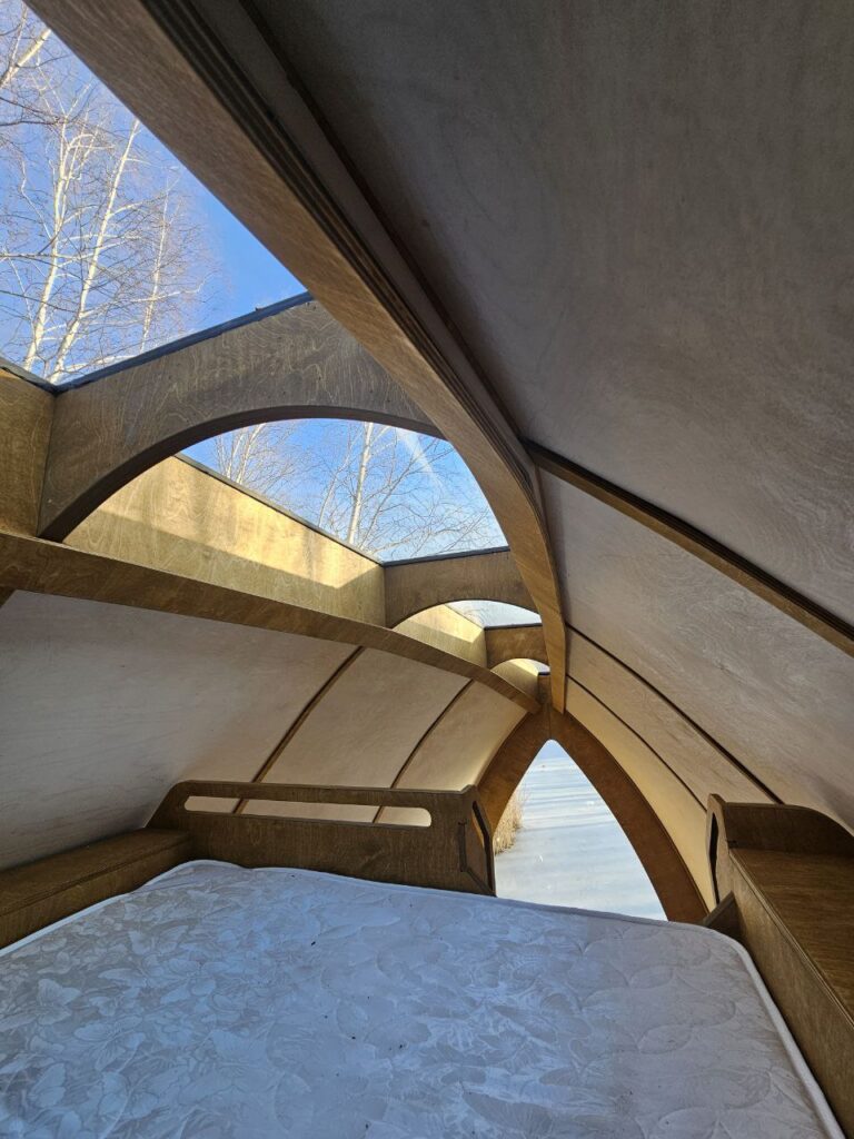 HIZ upper sleeping level beneath the glazed curved roof